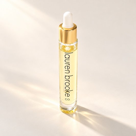 Lauren Brooke Deep Pore Spot Treatment in a clear dropper bottle with a gold collar