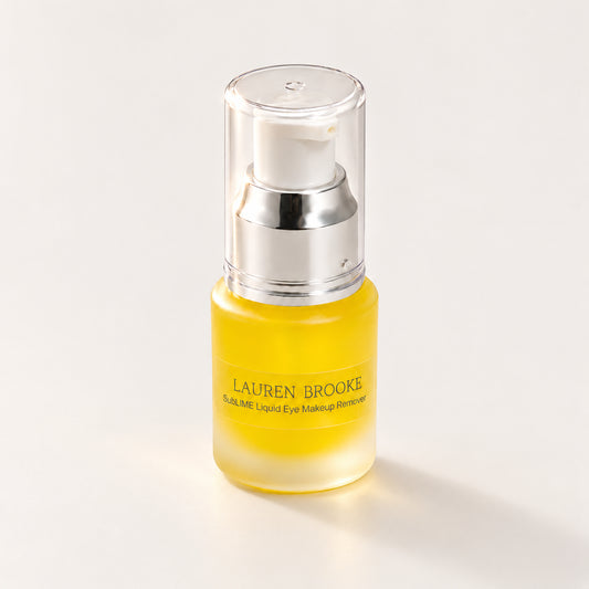 Lauren Brooke SubLIME Liquid Eye Makeup Remover in a frosted bottle with a silver and white pump
