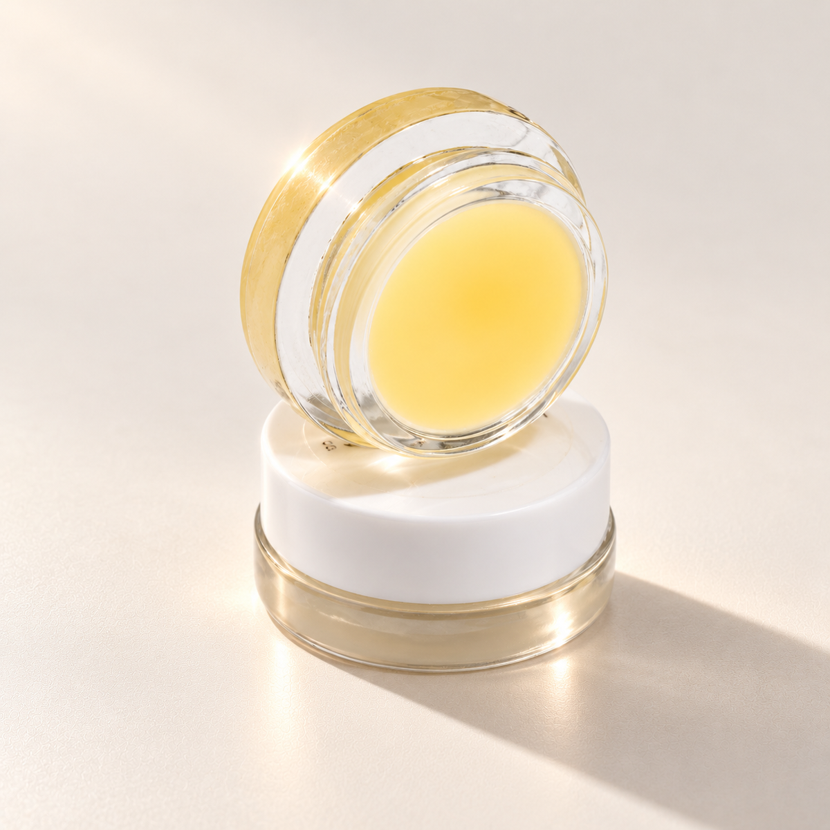 Lauren Brooke Vanilla Bean Lip Masque shown in open and closed clear jars
