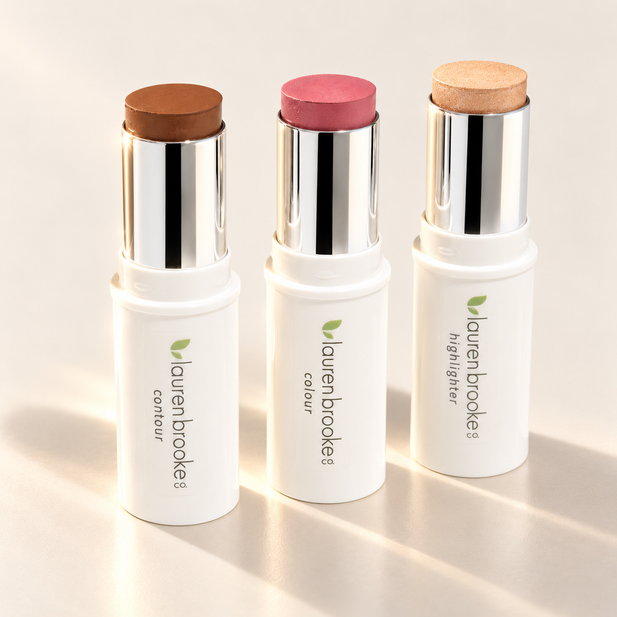 Lauren Brooke Botanical Stick Trio Kit with contour, colour and highlighter sticks in white cases