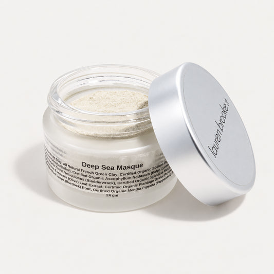 Lauren Brooke Deep Sea Masque powder in an open frosted jar with a silver lid