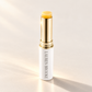 Lauren Brooke Eye Firming Crème stick in a white case with a gold barrel