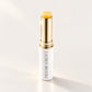 Lauren Brooke Eye Firming Crème stick in a white case with a gold barrel
