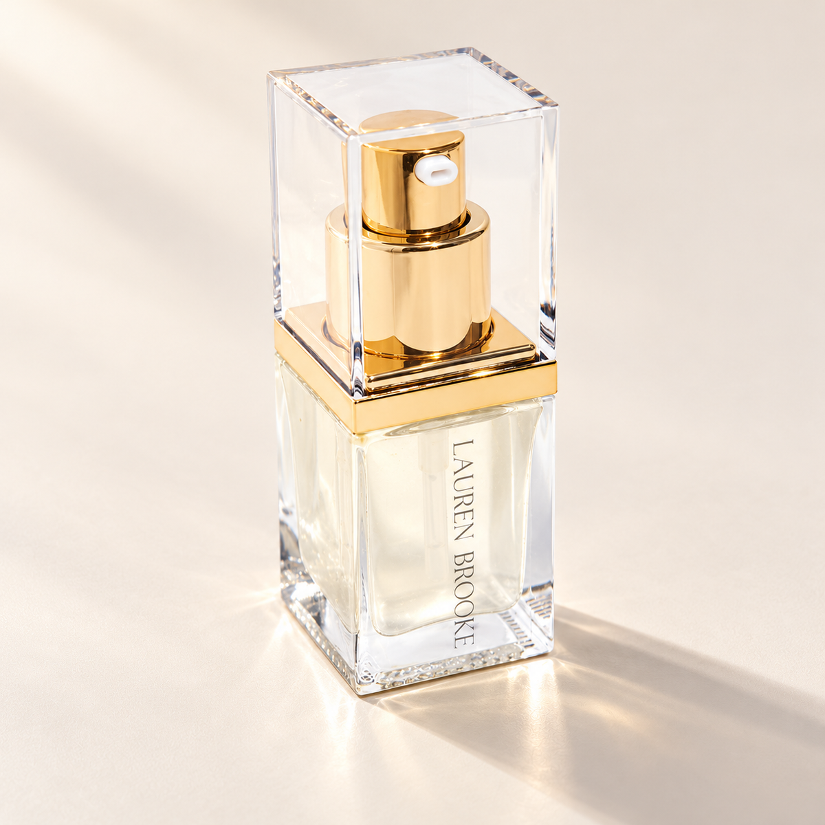 Lauren Brooke Intensive Immortal Elixir in a clear rectangular bottle with a gold pump