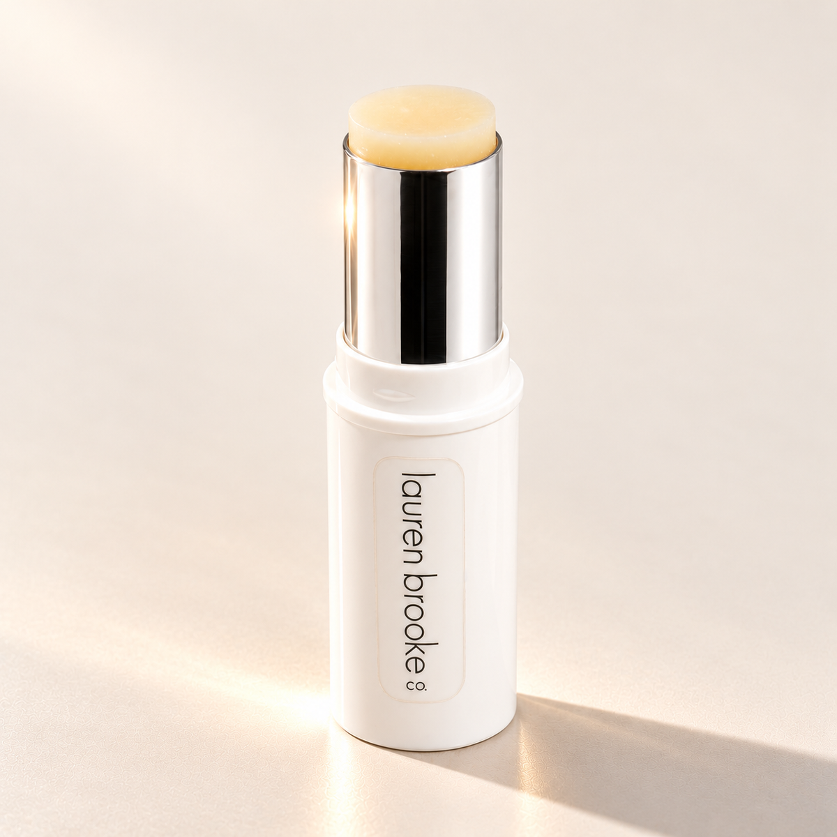 Lauren Brooke Soft-Focus Perfecting Primer stick in a white case with a silver barrel