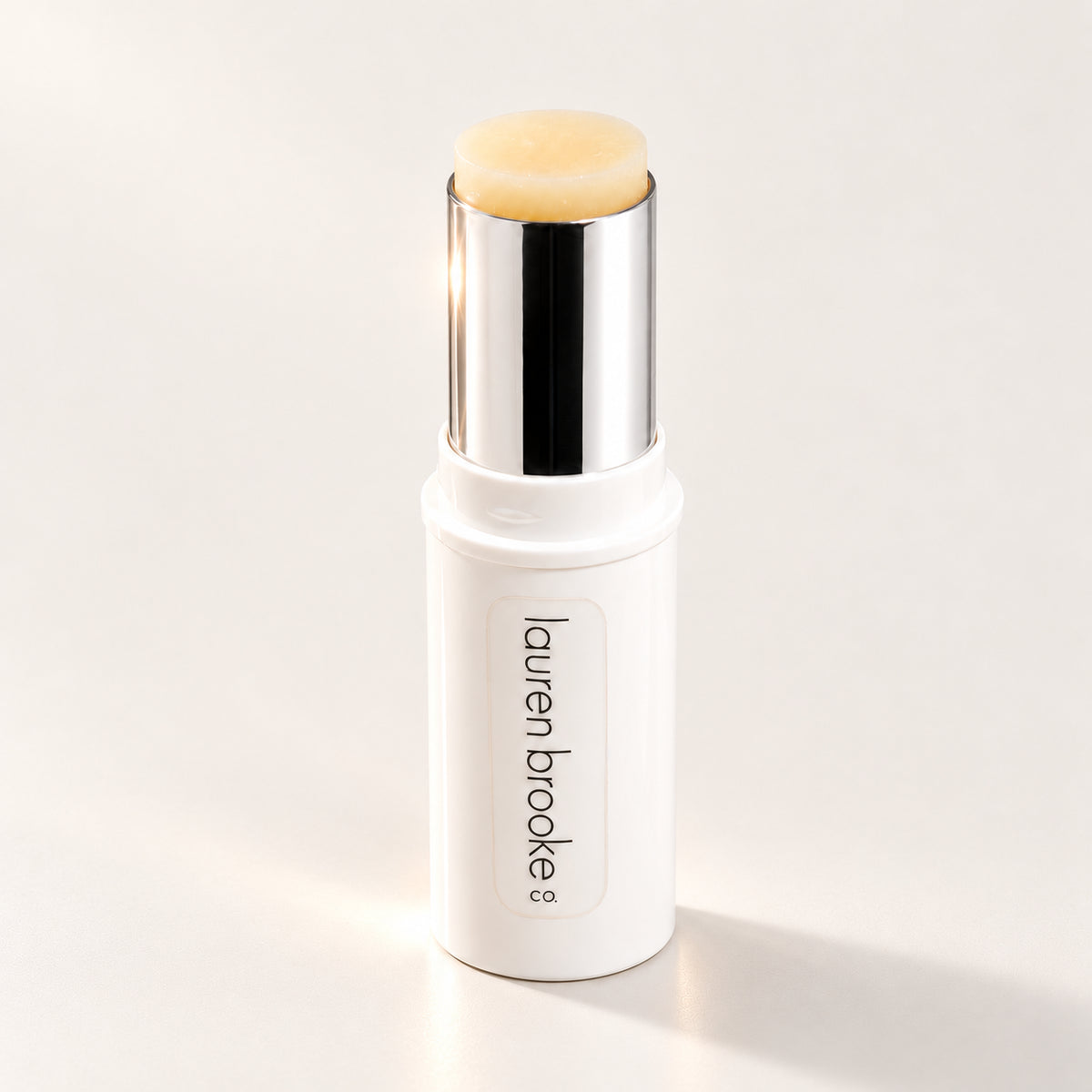 Lauren Brooke Soft-Focus Perfecting Primer stick in a white case with a silver barrel