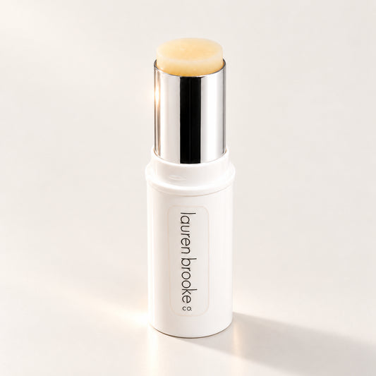Lauren Brooke Soft-Focus Perfecting Primer stick in a white case with a silver barrel