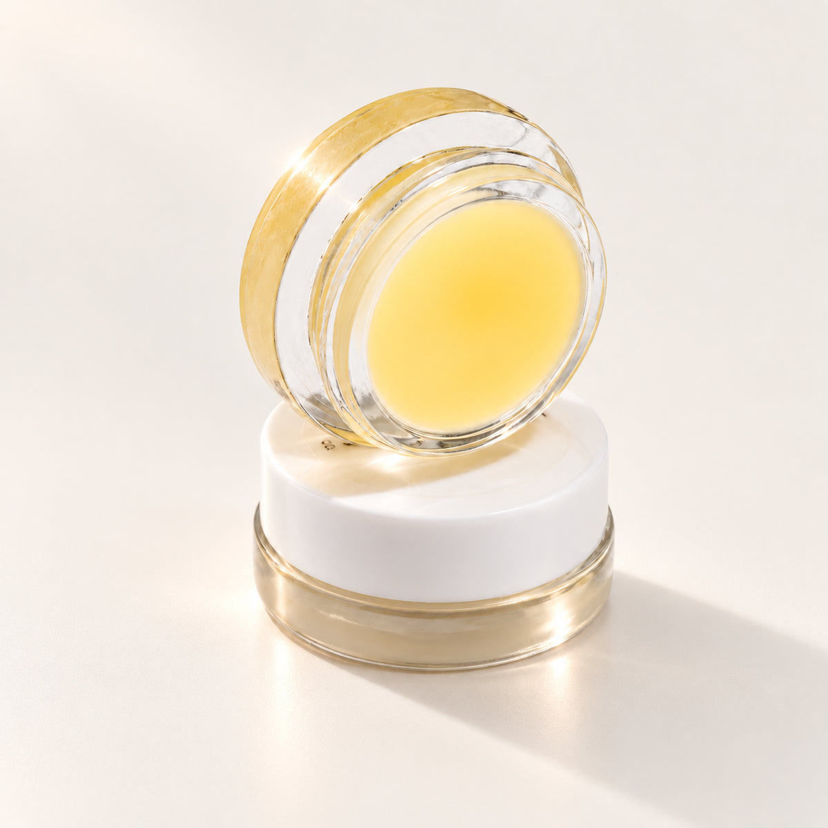 Lauren Brooke Vanilla Bean Lip Masque shown in open and closed clear jars